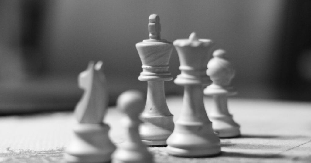 chess pieces on board/ strategies for teens through teen therapy/ Empower Counseling Birmingham/ 35223 35209 35216