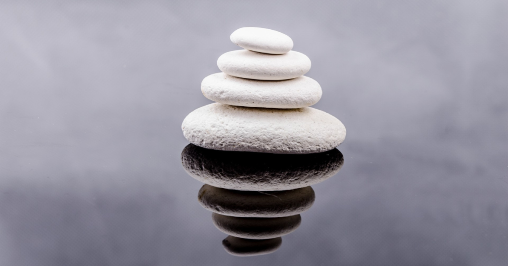 stack of rocks signifying mindfulness/ mindfulness to become more positive/ Empower Counseling/ Birmingham Alabama