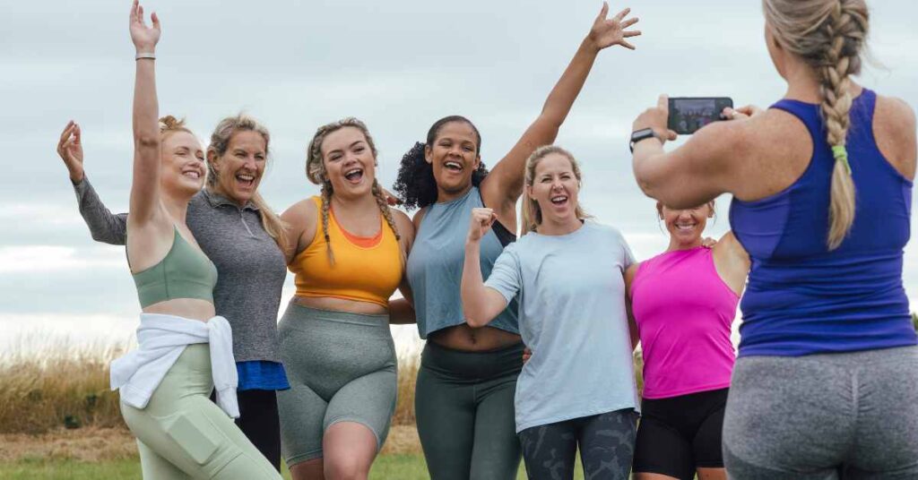 woman cheering for themselves after exercise
