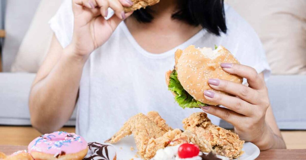 a woman binge eating/ Eating Disorder Treatment/ Birmingham Al/ Empower Counseling