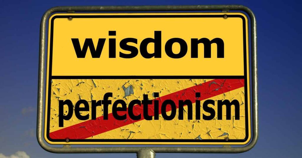 A sign with wisdom over the word perfectionism/ ACT Birmingham Al