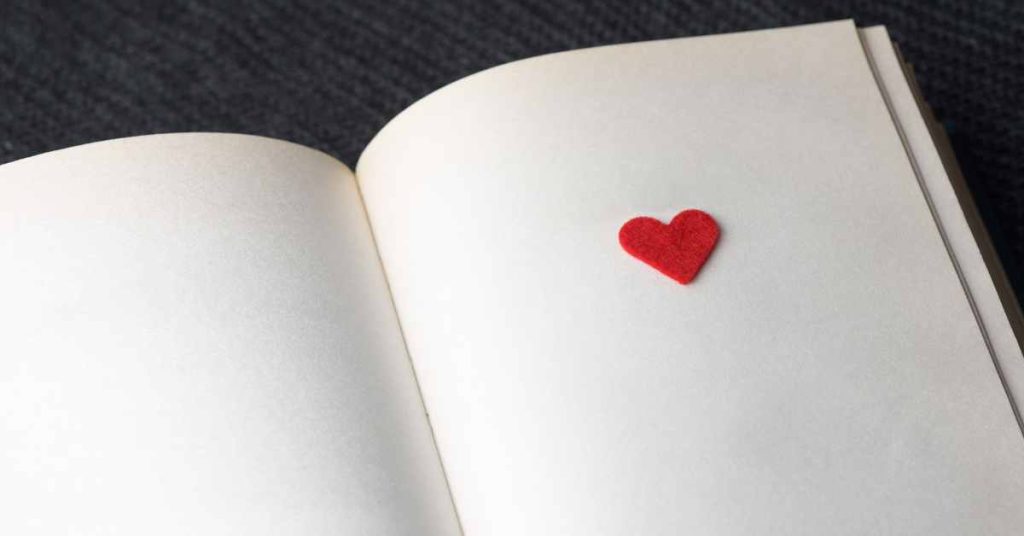 a valentine heart on the page of a book