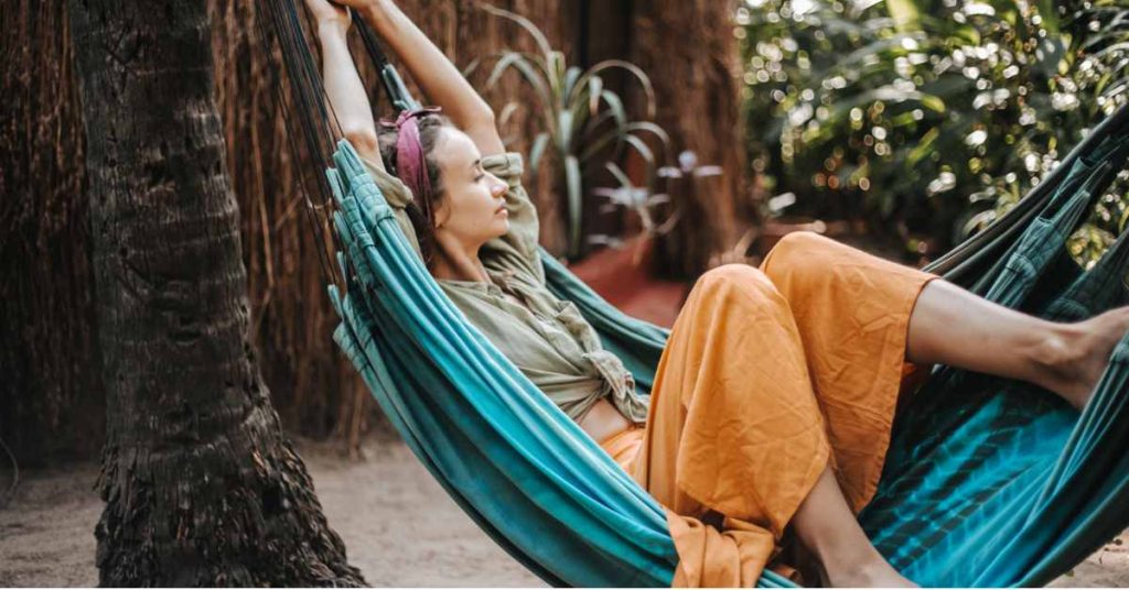 a woman in a hammock