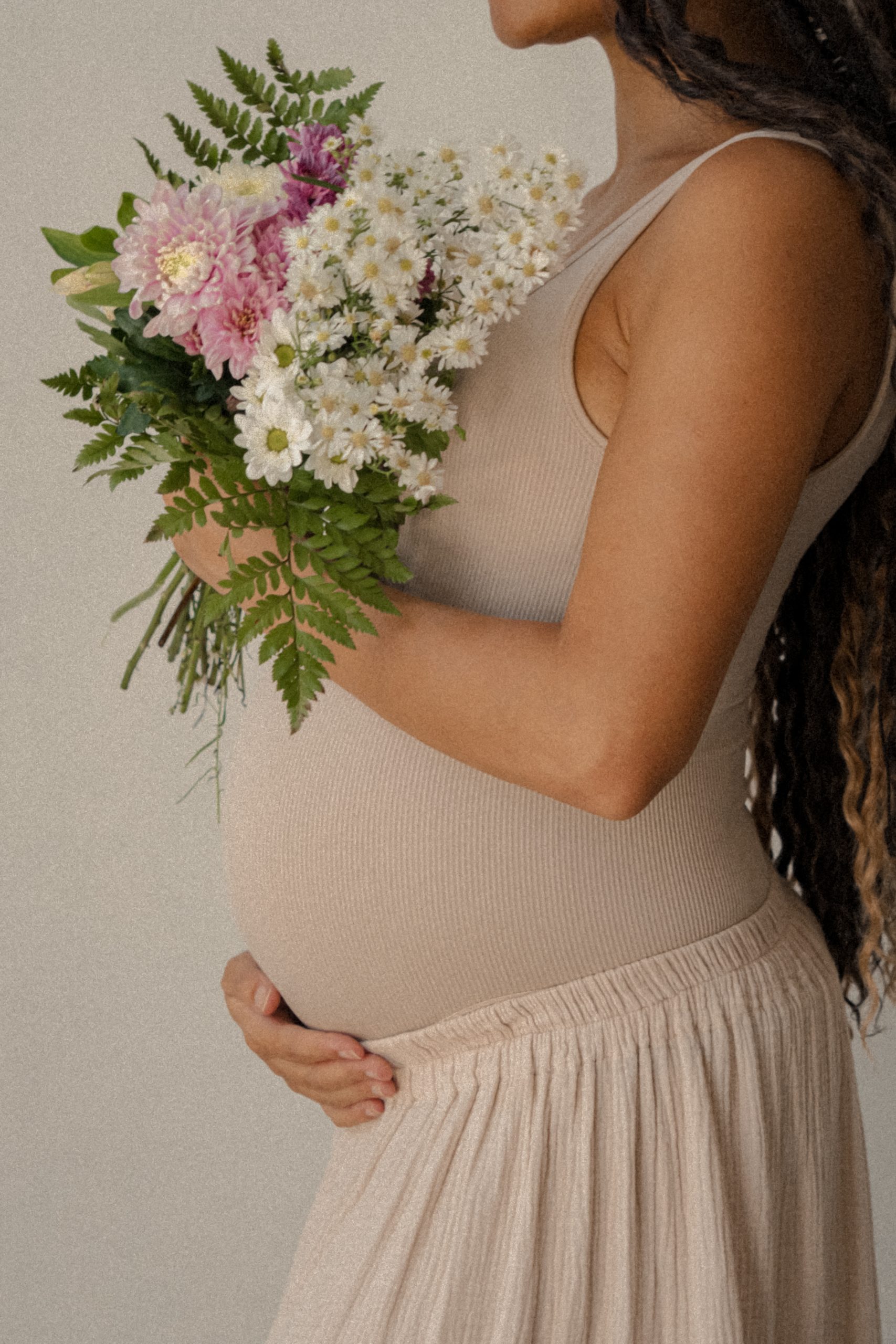 a woman expecting a child/ How ACT can help prepare for parenthood/